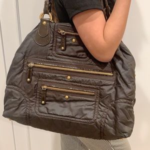 Tod’s Dark Brown Tote with Gold zippers